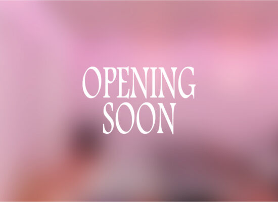 White text reading OPENING SOON is centered on a soft, out-of-focus pink and purple background, hinting at a new Pilates studio New York location. White text reading OPENING SOON is centered on a soft, out-of-focus pink and purple background, hinting at a new Pilates studio New York location.