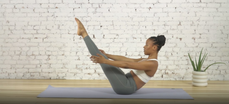 How to Do a Wall Roll Down in Pilates