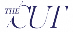 Logo for The Cut featuring the words in dark blue serif font. A stylized cutting line and partial slash visually separate the C from the rest of the word.